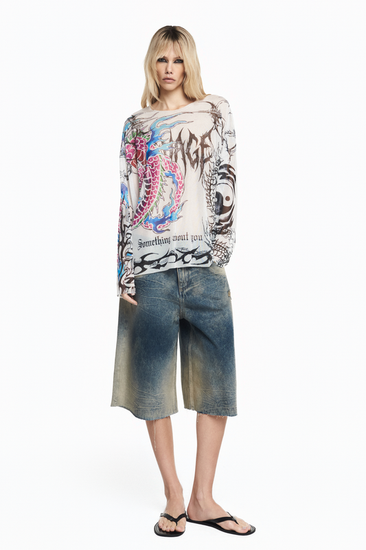 BERMUDA JEANS MANCHADA