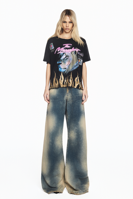 CALÇA JEANS FLARE AZUL MANCHADA
