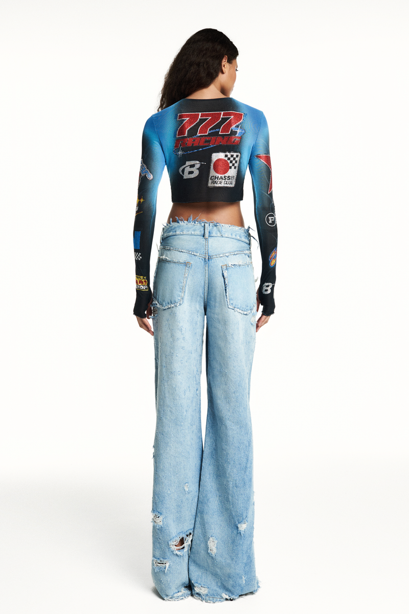 CALÇA JEANS PREGA INTERNA FLARE DESTROYED