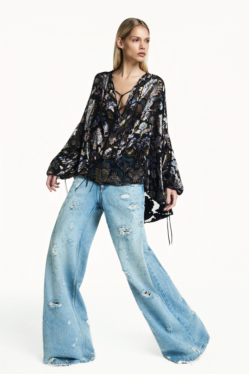 CALÇA JEANS PREGA INTERNA FLARE DESTROYED