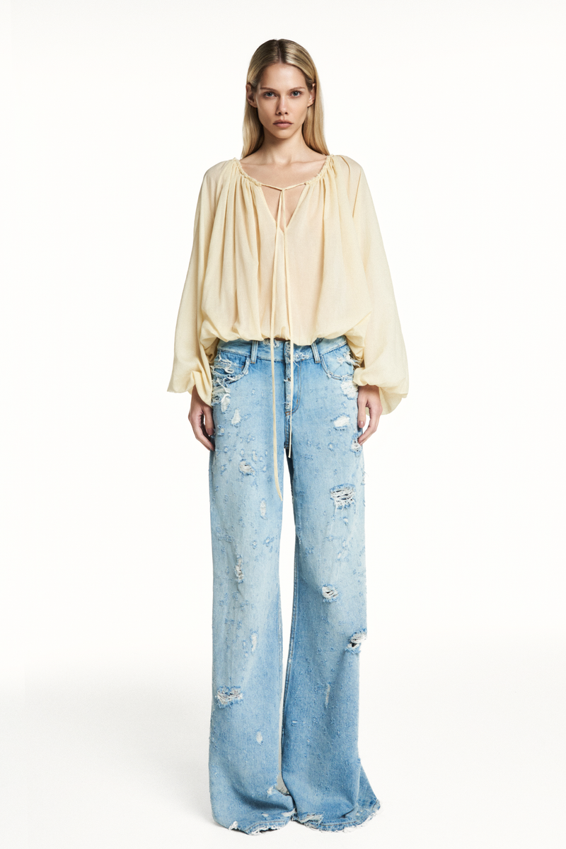 CALÇA JEANS PREGA INTERNA FLARE DESTROYED