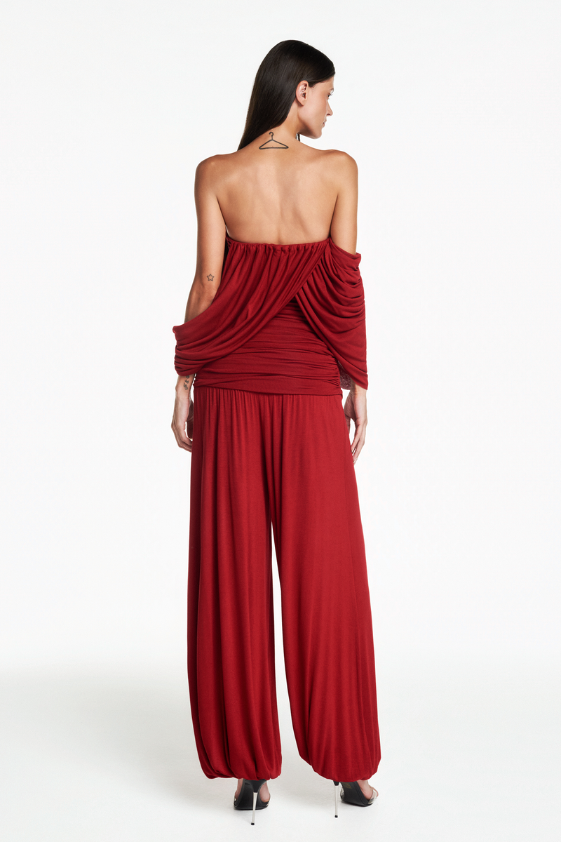 CALÇA PALA DRAPEADA ELÁSTICO BARRA MALHA VERMELHA