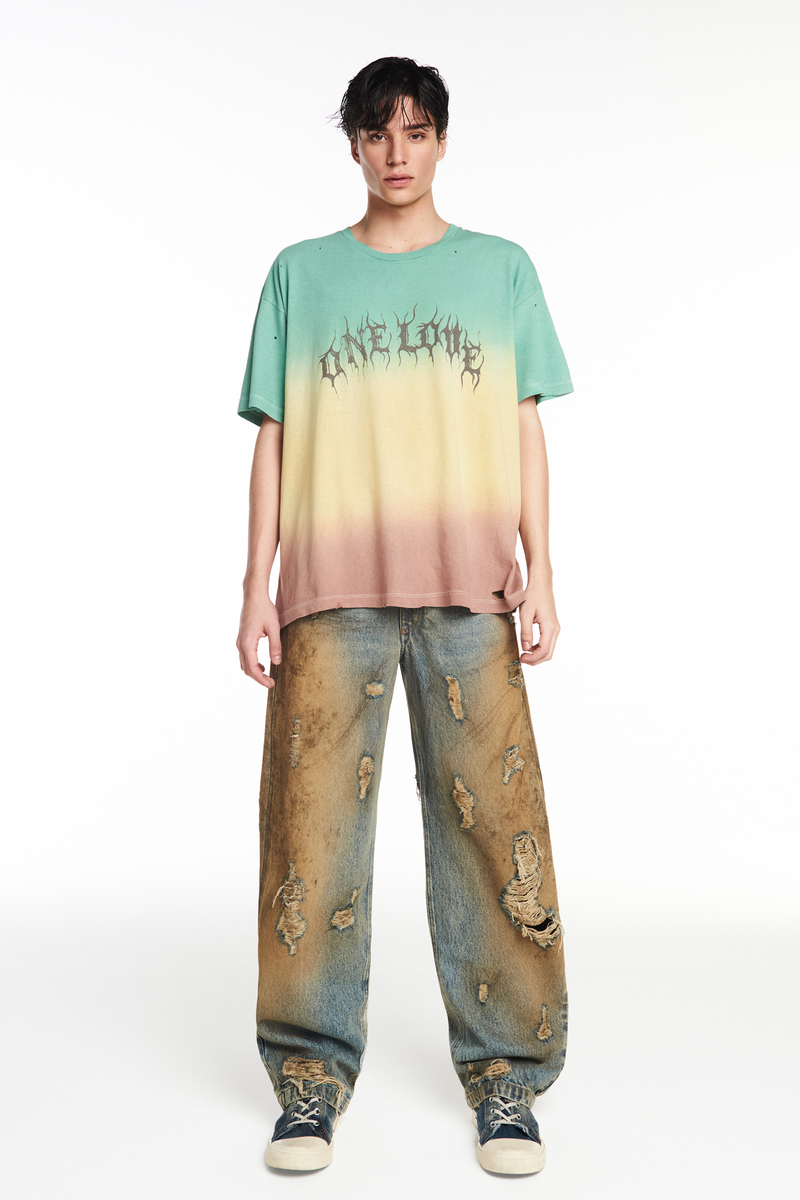 CALÇA JEANS BALLOON MANCHADA COM RASGOS (8952670748899)