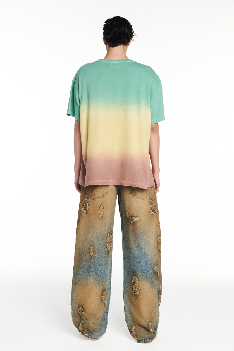 CALÇA JEANS BALLOON MANCHADA COM RASGOS (8952670748899)