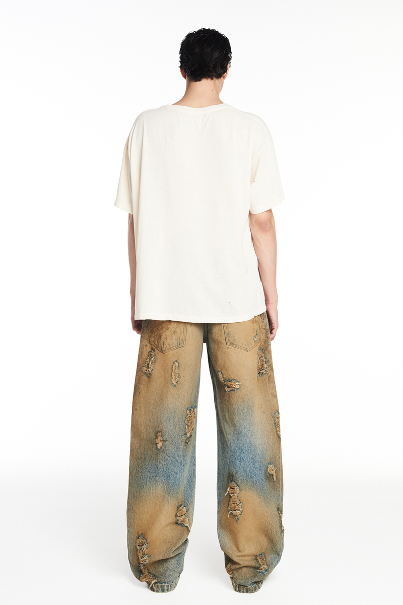 CALÇA JEANS BALLOON MANCHADA COM RASGOS (8952670748899)