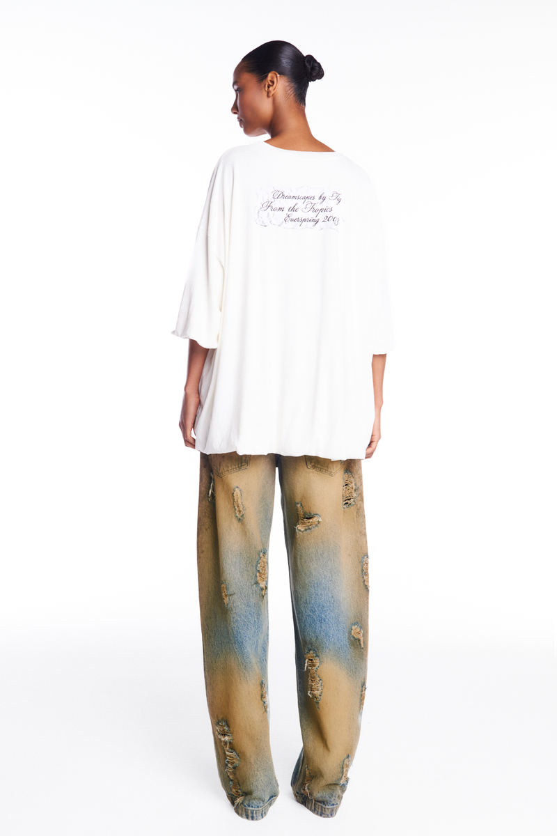 CALÇA JEANS BALLOON MANCHADA COM RASGOS (8952670748899)
