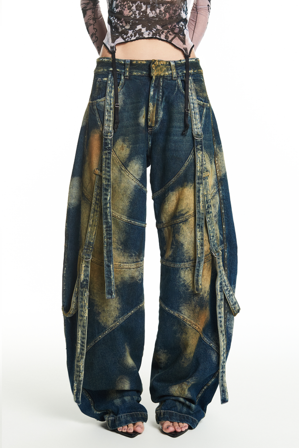 CALÇA JEANS MANCHADA RECORTES E FAIXAS (8930458796259)